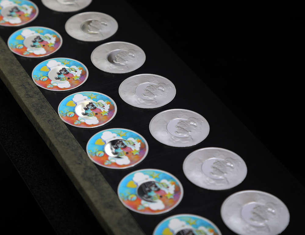 Coins with colour printing. Photo: Bulmint.
