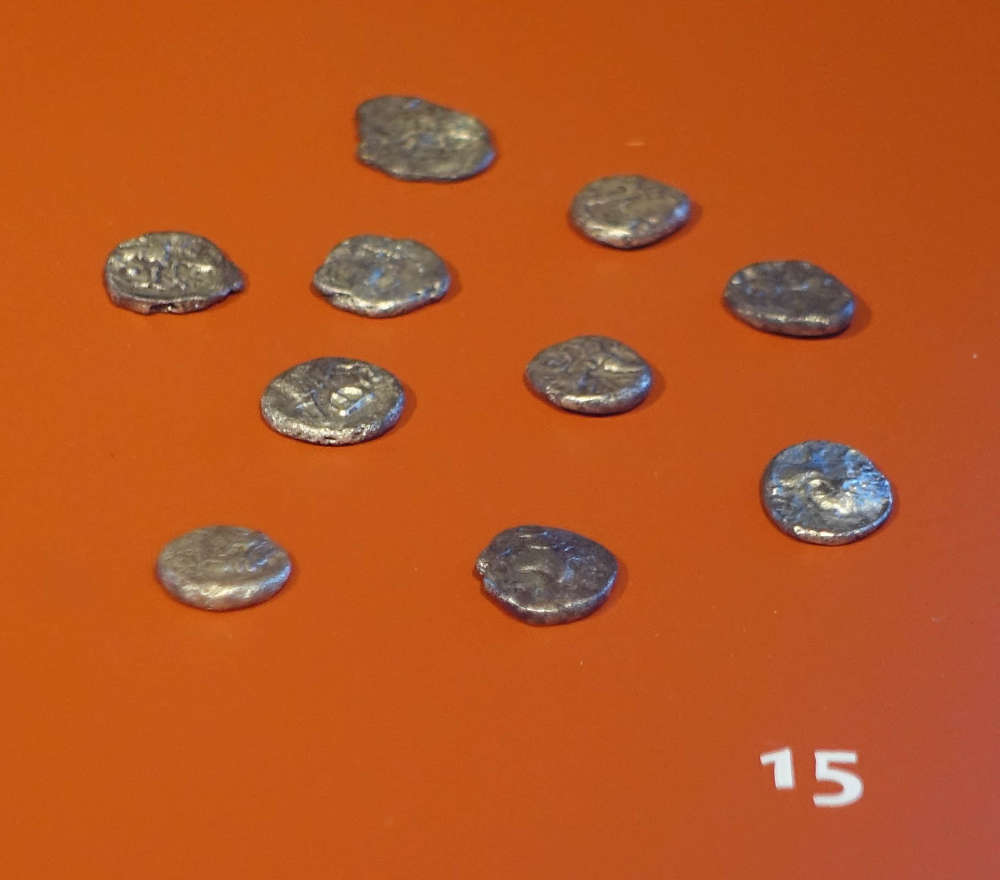 A small coin hoard of Celtic silver coins, hidden in the ground by a Celtic warrior before the battle. Photo: KW.