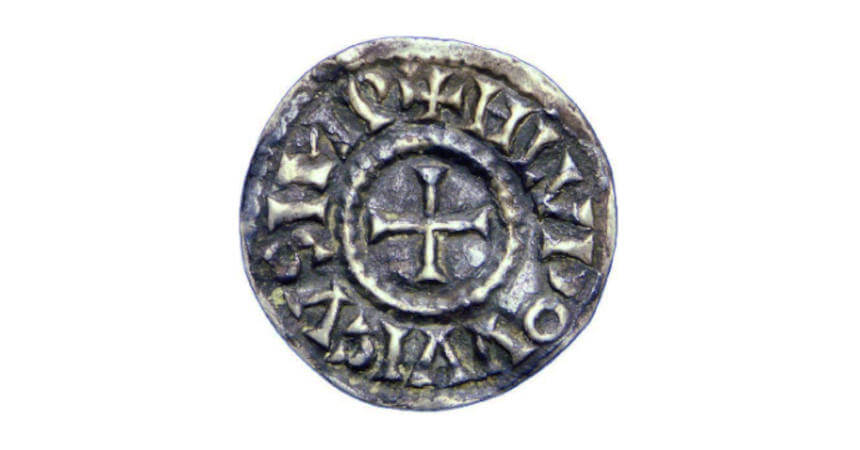 An 814/840 silver denier of Emperor Louis the Pious shows the long enduring symbolism of the cross and church on coinage.