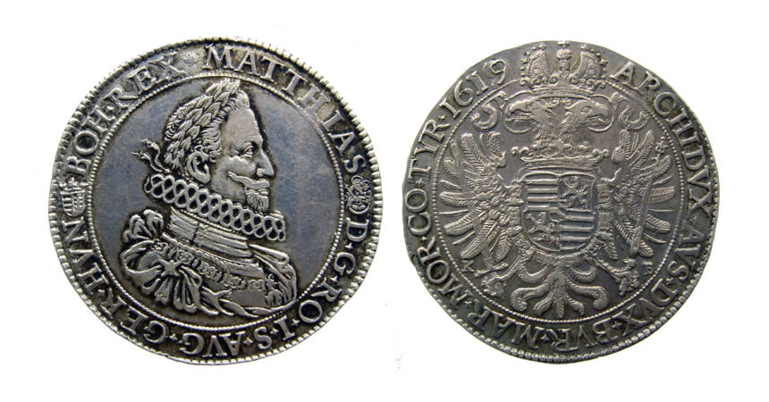 A 1619 silver thaler, minted in Kremnica, showing the laurel-head bust of Matthias II.