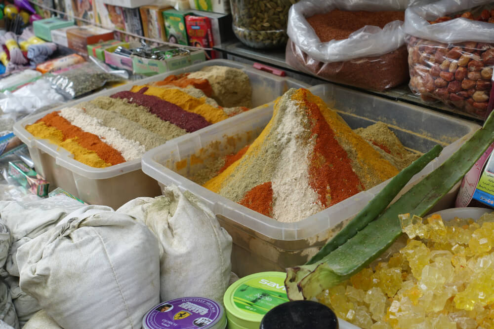 Not for tourists, the stands on the bazar. Please note the large lump of rock sugar on the right. Be careful when you put Iranian rock sugar in your tea: there is a small piece of twine at its core, which of course doesn’t dissolve. Photo: KW. Not for tourists, the stands on the bazar. Please note the large lump of rock sugar on the right. Be careful when you put Iranian rock sugar in your tea: there is a small piece of twine at its core, which of course doesn’t dissolve. Photo: KW.