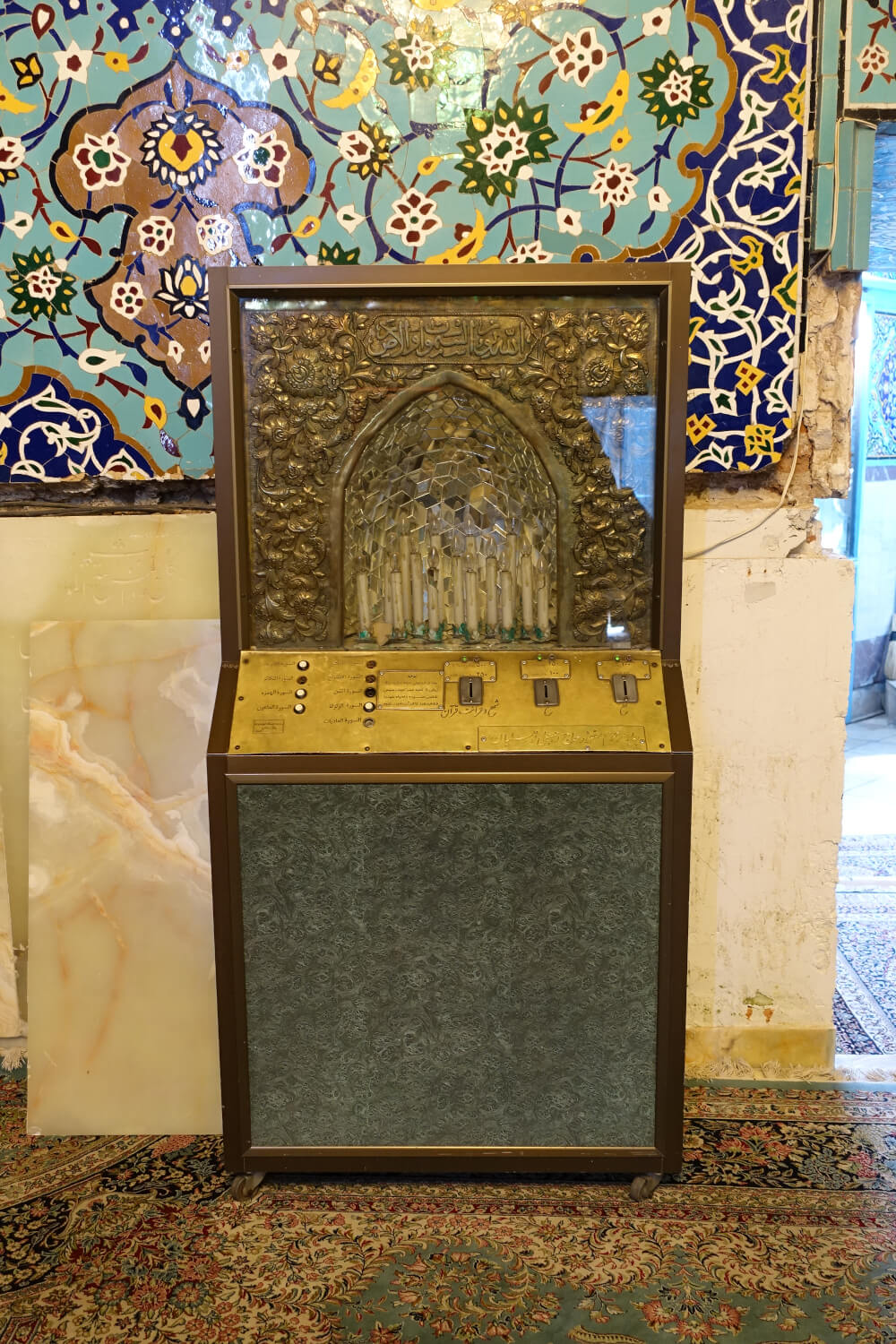 An automated dispenser for prayer candles in the sanctuary, something other religions do too. Photo: KW. An automated dispenser for prayer candles in the sanctuary, something other religions do too. Photo: KW.